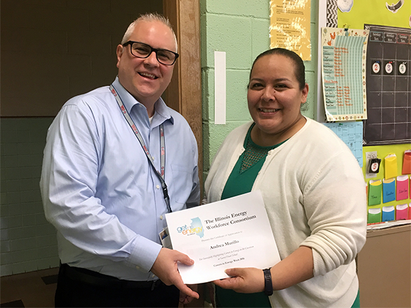 IEWC member Scott Tryner of Exelon presented the award to Andrea Murillo at Sacred Heart School.